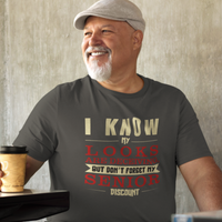 Heather gray t-shirt in bold, colorful lettering of alternating sizes about that senior discount.  
