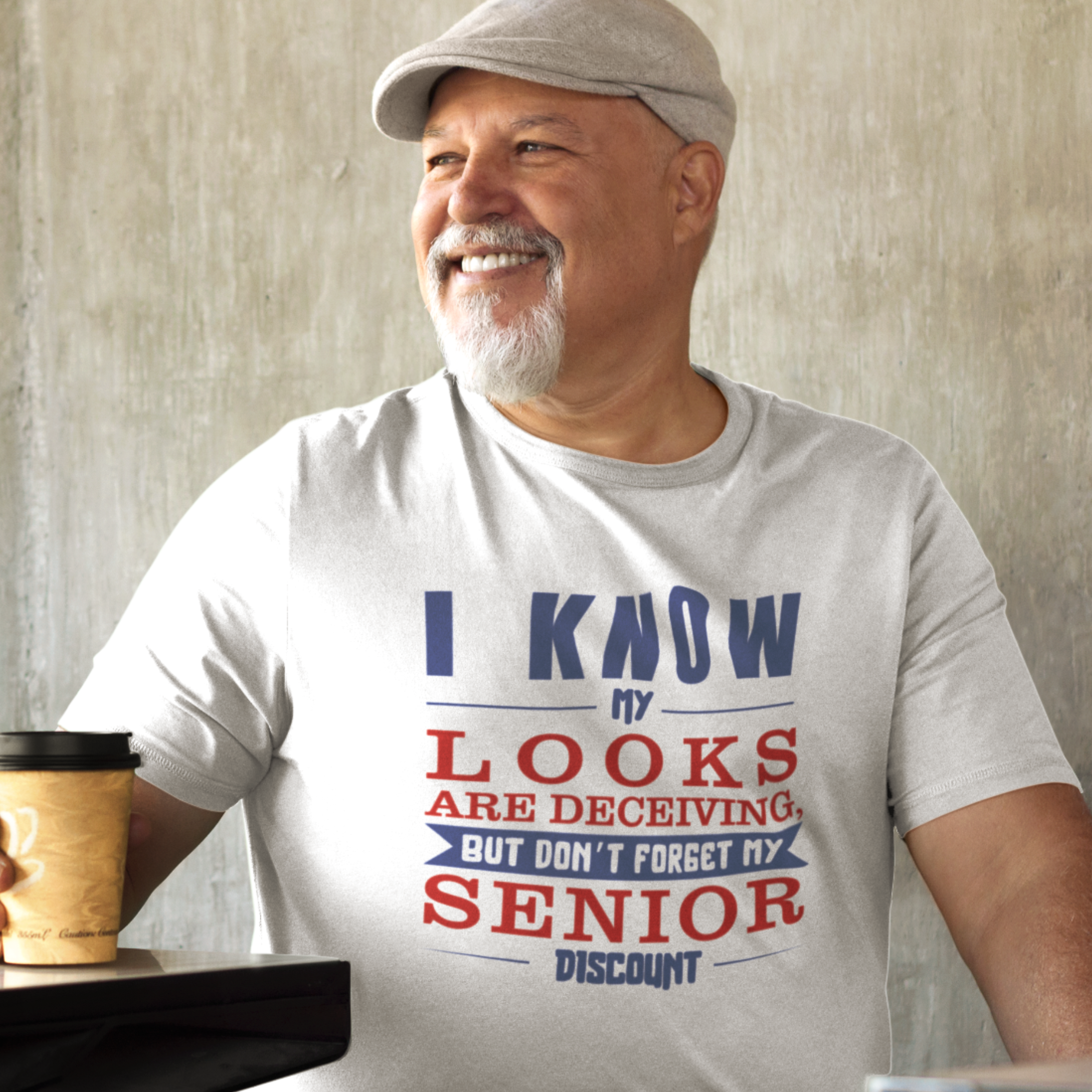White t-shirt in bold, colorful lettering of alternating sizes about that senior discount.  