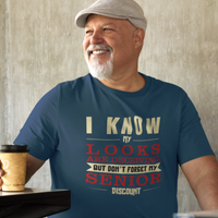Navy blue t-shirt in bold, colorful lettering of alternating sizes about that senior discount.  
