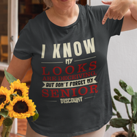 Black t-shirt in bold, colorful lettering of alternating sizes about that senior discount.  