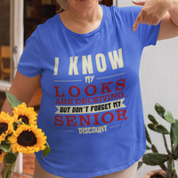 Royal blue t-shirt in bold, colorful lettering of alternating sizes about that senior discount.  