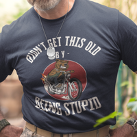 Navy blue t-shirt featuring a mean-looking cartoon grizzly on the back of a motorcycle blowing flames out the pipes.