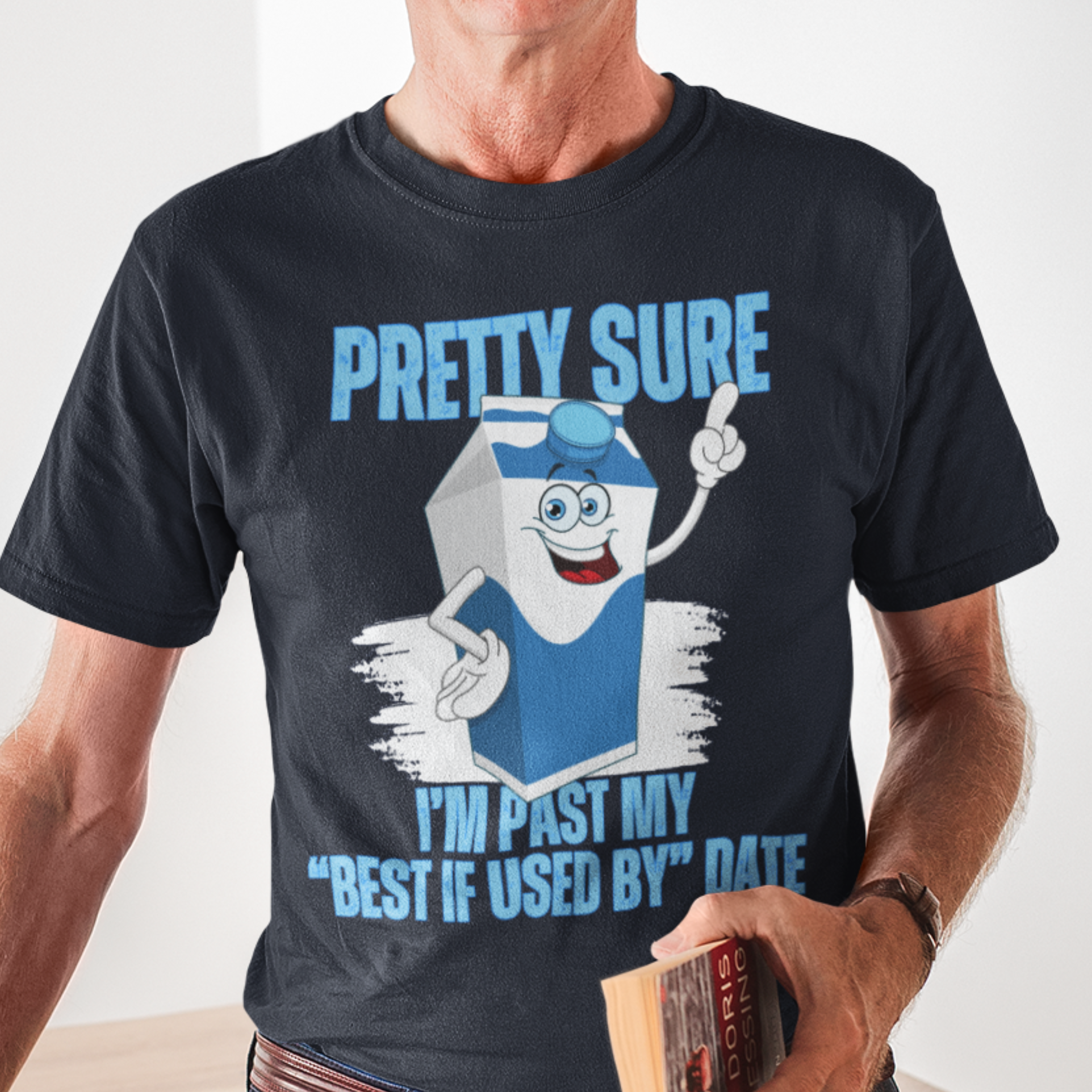 Navy blue t-shirt with neon lettering, featuring a cartoon carton of milk. 