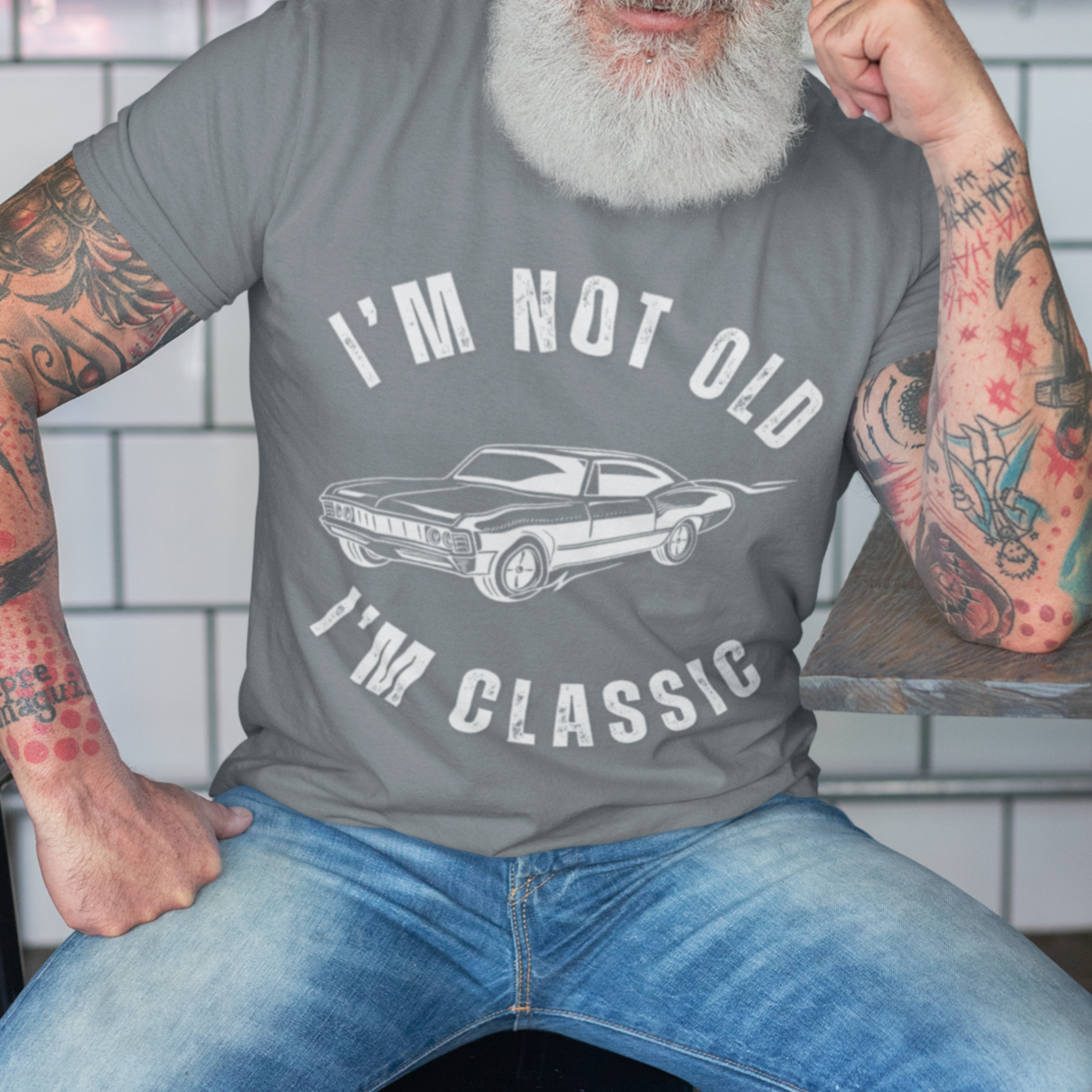 Heather gray tee featuring contour drawing of a 70s style muscle car 