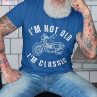 Royal blue tee featuring contour drawing of a classic motorcycle