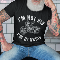Black tee featuring contour drawing of a classic motorcycle