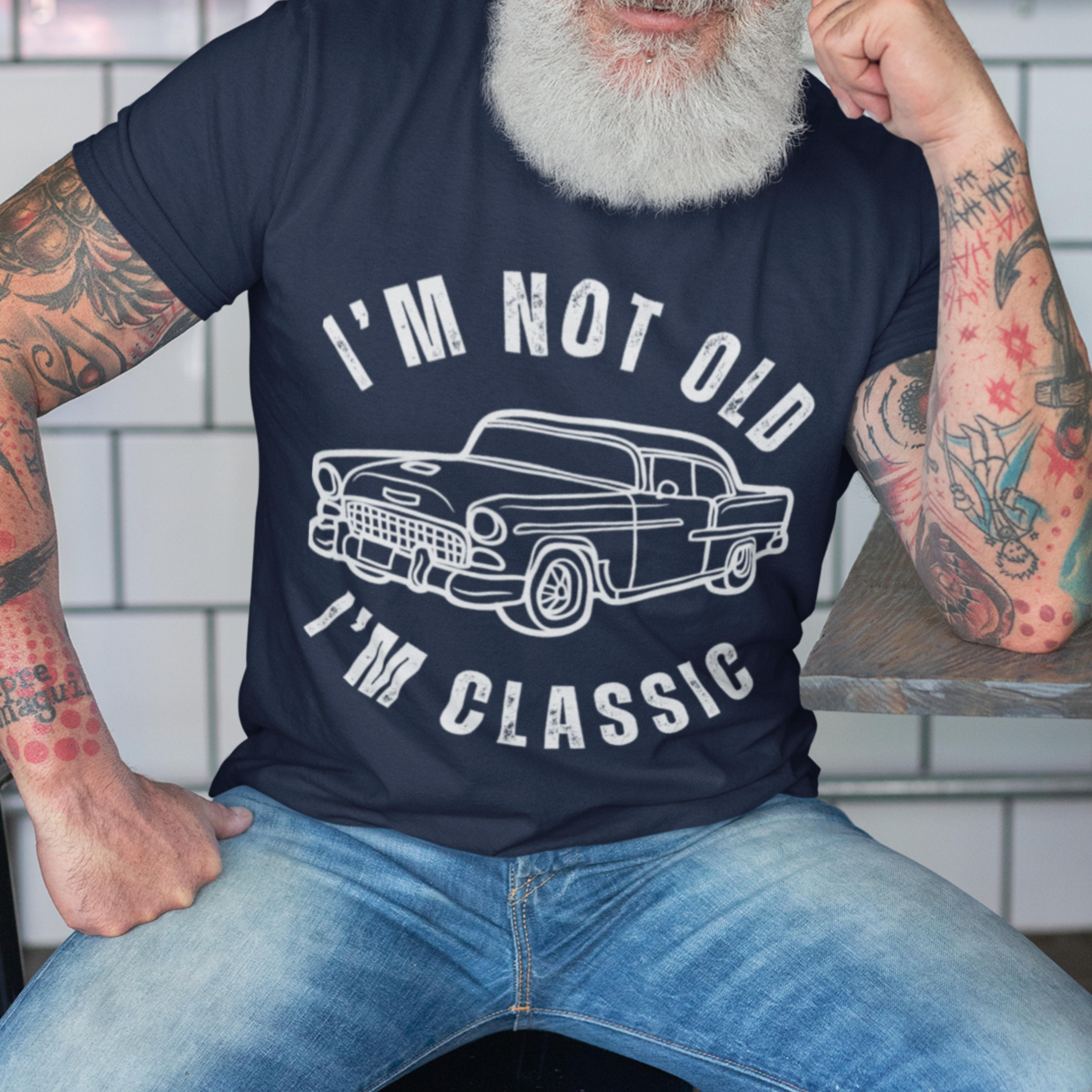 Navy blue tee featuring contour drawing of a popular 50s style automobile 