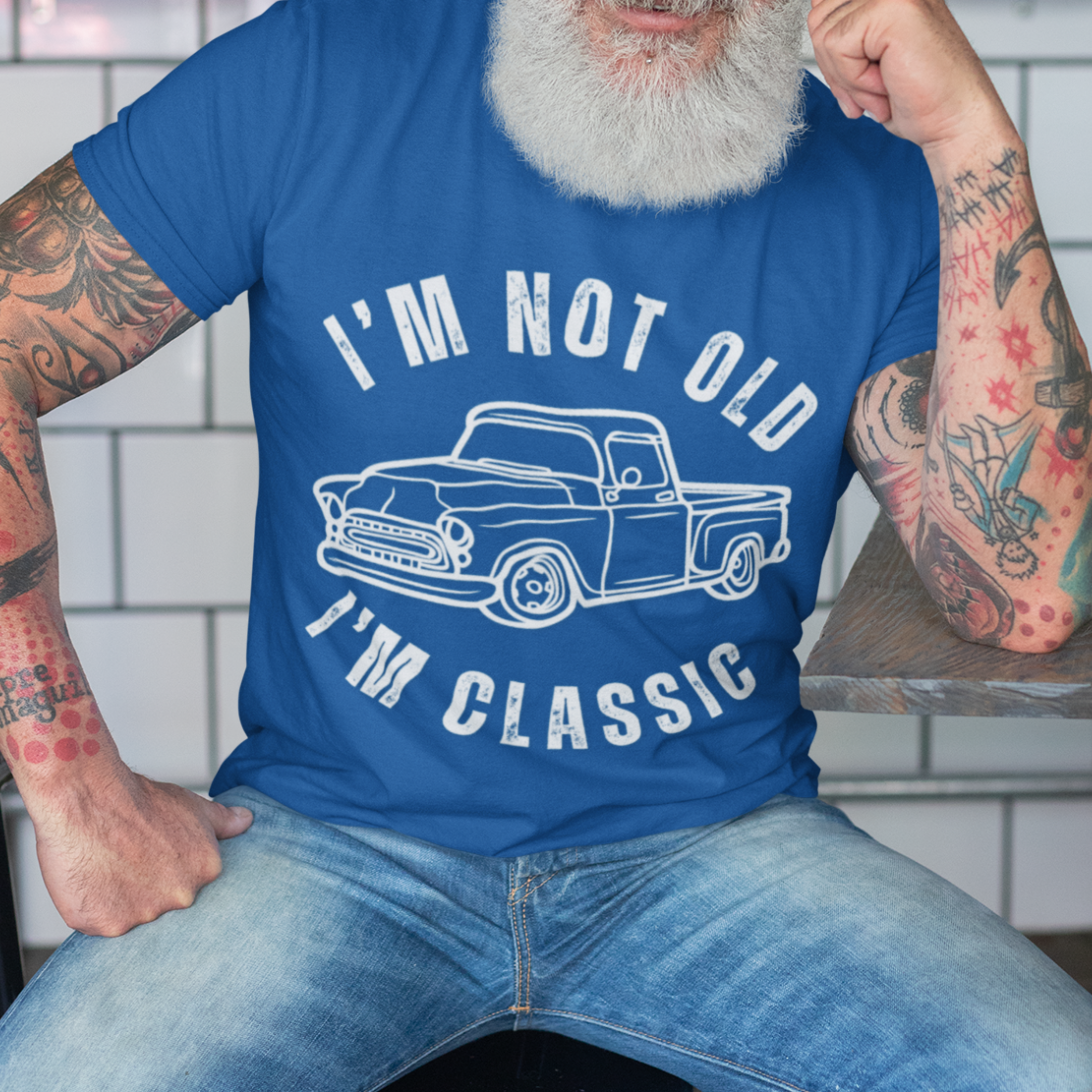 Royal blue tee featuring contour drawing of a 40s and 50s classic pickup truck body style