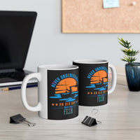 Two mugs showing both left and right views with fishing-themed designs on a desk.