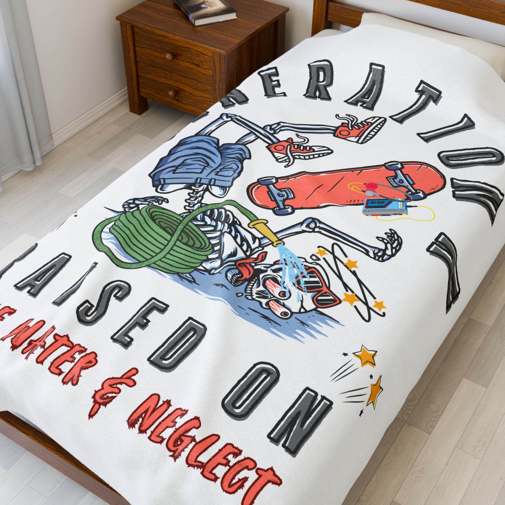 60X80 blanket with colorful graphics and text on a bed in a room.