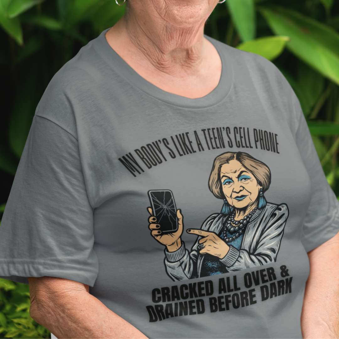 Heather gray t-shirt featuring a cartoon older woman pointing to a broken cell phone 